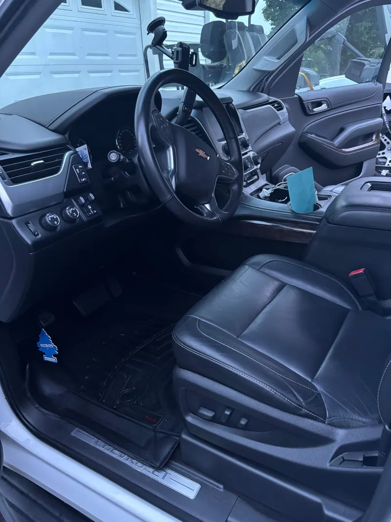 Chevrolet Tahoe driver's seat, steering wheel and dashboard cleaned